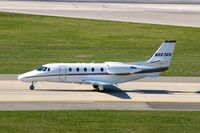 N667QS @ CID - Taxiing on Alpha after landing runway 31 - by Glenn E. Chatfield