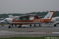 N3267T @ PVG - Another day catching her, this time fresh from a rainshower - by Paul Perry