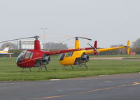 G-BWTH @ EGTB - R22 IN THE HELICOPTER PARK - by BIKE PILOT