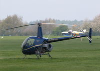 G-BXXN @ EGTB - R22 IN THE HELICOPTER PARK - by BIKE PILOT