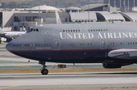 N107UA @ KLAX - Taxi to gate - by Todd Royer