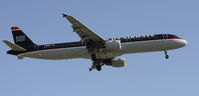 N176UW @ KLAX - Landing 24R at LAX - by Todd Royer