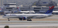 N614DL @ KLAX - Landing 24R at LAX - by Todd Royer