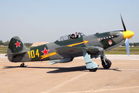 N6373Y @ LFI - Sean Carroll in his YAK-9 taxiing in front of the crowd after his performance on Sunday. - by Dean Heald