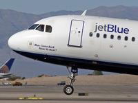 N641JB @ KLAS - jetBlue Airways - 'Blue Come Back Now Hear' / 2006 Airbus A320-232 - by Brad Campbell