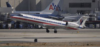 N841AE @ KLAX - Departing LAX on 25R - by Todd Royer