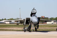 82-0021 @ LFI - A maintenance crew member services the liquid oxygen system of one of the USAF West Coast Demo Team F-15C Eagles on the flight line at Langley AFB. - by Dean Heald