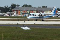 YV2299 @ LAL - Arriving at Sun N Fun 2009 - Lakeland, Florida. N478JB landing in the background. - by Bob Simmermon