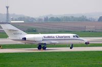 N227CK @ CID - Taxiing across on Alpha on the way to PS Air - by Glenn E. Chatfield