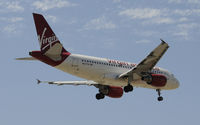 N527VA @ KLAX - Landing 24R at LAX - by Todd Royer