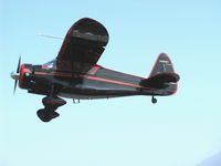 N999WT @ SZP - 1943 Howard DGA-15P 'Black Bear', P&W R-985 Wasp Jr. 450 Hp, takeoff climb rwy 22 - by Doug Robertson