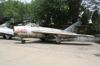 31481 - Shenyang J-5   Located at Datangshan, China - by Mark Pasqualino