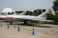 31682 - Shenyang J-5   Located at Datangshan, China - by Mark Pasqualino