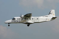 D-CMNX @ EGBJ - German Dornier 228 arrives with the flight from the Isle of Man - by Terry Fletcher