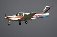 N8392V @ KSAT - First picture of this Piper on short final rwy 3. In the light of the sunset sun on a dark sky. - by Philippe Bleus