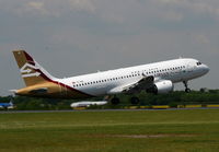 TS-INE @ EGCC - Libyan Airlines  Airbus A320-211 - by Chris Hall