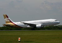 TS-INE @ EGCC - Libyan Airlines  Airbus A320-211 - by Chris Hall