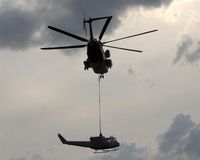 84 50 @ EDAD - CH 53 transport heli of german Bundeswehr is lifting a demaged Huey - by Holger Zengler