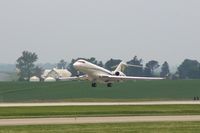 N313RF @ CID - Just lifting off runway 9 - by Glenn E. Chatfield