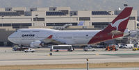 VH-OEF @ KLAX - Taxi to gate - by Todd Royer