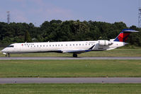 N133EV @ ORF - Delta Connection (Atlantic Southeast Airlines) N133EV (FLT ASQ4934) rolling out on RWY 5 after arrival from Hartsfield-Jackson/Atlanta Int'l (KATL). - by Dean Heald