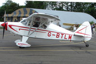 G-BTLM @ EGSX - Piper Pa-22-160 at North Weald on 2009 Air Britain Fly-in Day 1 - by Terry Fletcher