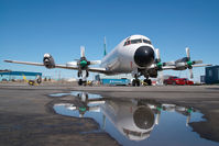 C-FBAQ @ CYZF - Buffalo Airways Lockheed Electra - reflection - by Dietmar Schreiber - VAP