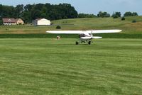 N88588 @ 2D7 - Departing 28 at the Beach City, Ohio Father's Day fly-in. - by Bob Simmermon