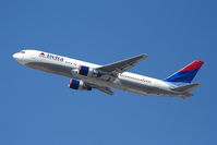 N121DE @ KLAX - Delta 763 Departing KLAX 25R to KATL - by Mark Kalfas