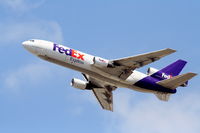 N562FE @ KLAX - FedEx MD-10-10F, Departing 25L KLAX - by Mark Kalfas