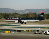N162UW @ LAX - US Airways 2001 Airbus A321-211, c/n: 1412 rolling @ LAX 18.11.08 - by Steve Nation