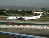 N416QX @ LAX - Horizon 2001 Bombardier DHC-8-402 rolling - by Steve Nation