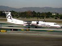 N416QX @ LAX - Horizon 2001 Bombardier DHC-8-402 taxiing - by Steve Nation