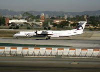 N433QX @ LAX - Horizon 2008 Bombardier DHC-8-402 rolling - by Steve Nation