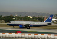 N437UA @ LAX - United 1997 Airbus A320-232 in older colors rolling on Runway 24L - by Steve Nation