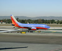 N442WN @ LAX - Southwest 2003 Boeing 737-7H4 in new colors w/winglets taxiing - by Steve Nation