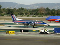 N582SW @ LAX - Sky west 1999 EMB-120R taxiing to RW 24L - by Steve Nation