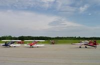 N110PS @ 4A7 - N110PS (far left) and other Pitts aircraft at 4A7 - by J. Michael Travis