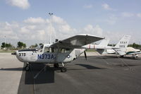 N373AZ @ KPGD - Cessna O-2A - by Mark Pasqualino
