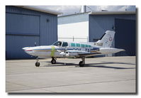N75GB @ KATW - 1975 Cessna 402B, Old Freight DOG - by Nick Van Dinter