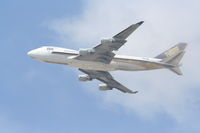 9V-SFK @ KLAX - Singapore 747-412F, 9V-SFK, busting through the layer departing 25L KLAX - by Mark Kalfas