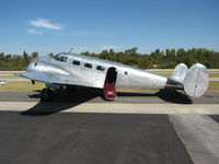 N476PA @ AJO - Polished aluminum 1952 Beech 3NM (C-45) @ photographer friendly Corona Municipal Airport, CA - by Steve Nation