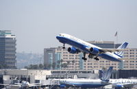N554UA @ KLAX - United Airlines Boeing 757-222, N554UA departs KLAX RWY 25R - by Mark Kalfas