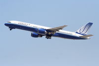 N554UA @ KLAX - United Airlines Boeing 757-222, N554UA departs KLAX RWY 25R - by Mark Kalfas