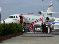 F-HBDA @ LFPB - Dassault Falcon 900EX F-HBDA Dassault Aviation well hidden behind bushes, VIP's and aircrat - by Alex Smit