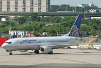N37293 @ KEWR - A CO ETOPS certified 737NG taxies toward the main runway at Newark. - by Daniel L. Berek