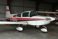 G-BOXU @ EGCW - Grumman AA-5B hangared on 2009 Welshpool Air Day - by Terry Fletcher