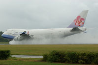 B-18718 @ AMS - Rain Spotting at AMS - by Robbie0102