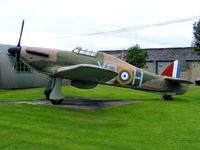 BAPC265 @ X4EV - Hawker Hurricane I replica was unveiled on 20 August 2000 and installed as the gate guardian on 8 October 2000 by the Canadian High Commissioner, the Hon. Roy McLaren PC - by Chris Hall