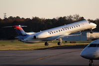 N844MJ @ ORF - Delta Connection (Freedom Airlines) N844MJ (FLT FRL160) departing RWY 23 enroute to John F Kennedy Int'l (KJFK). - by Dean Heald